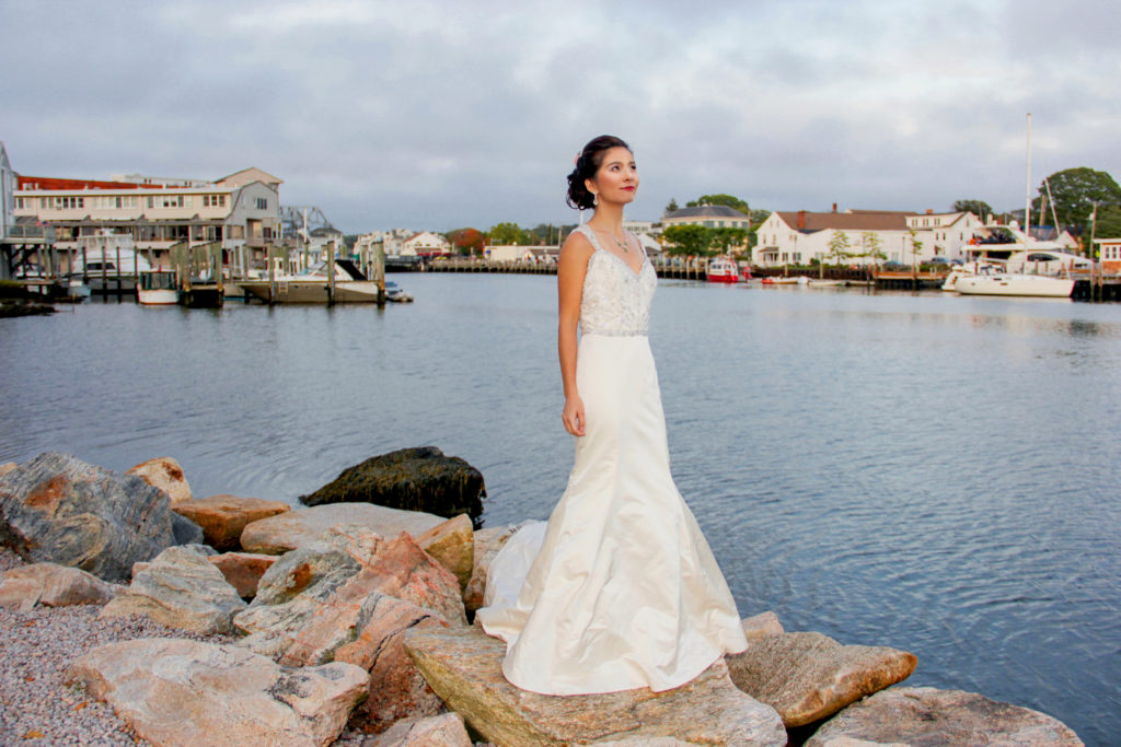 Bride on rocks near water - White Mountains Wedding Photography