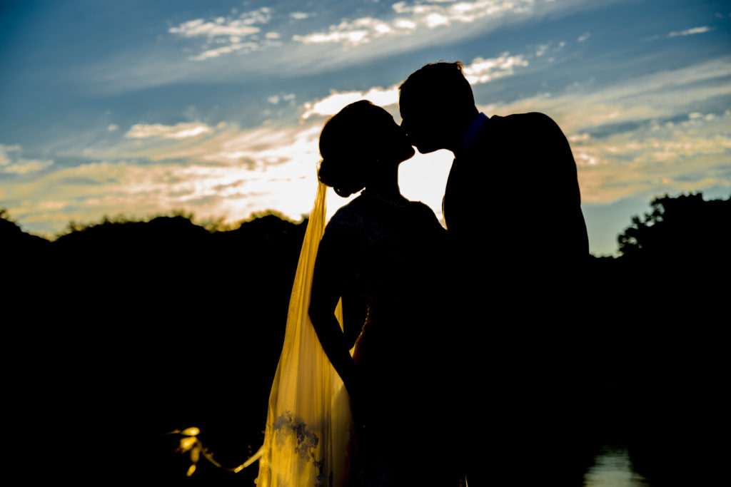 Silhouette of kissing couple - White Mountains Wedding Photography