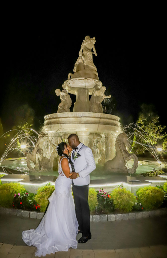 Couple in front of fountain - White Mountains Wedding Photography