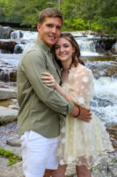 Douget engagement - posing for the camer in front of waterfall