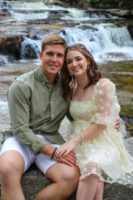 Douget engagement - sitting in front of waterfall